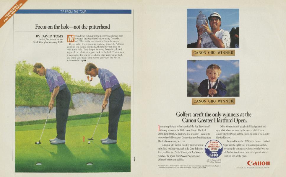 Focus on the hole—not the putterhead